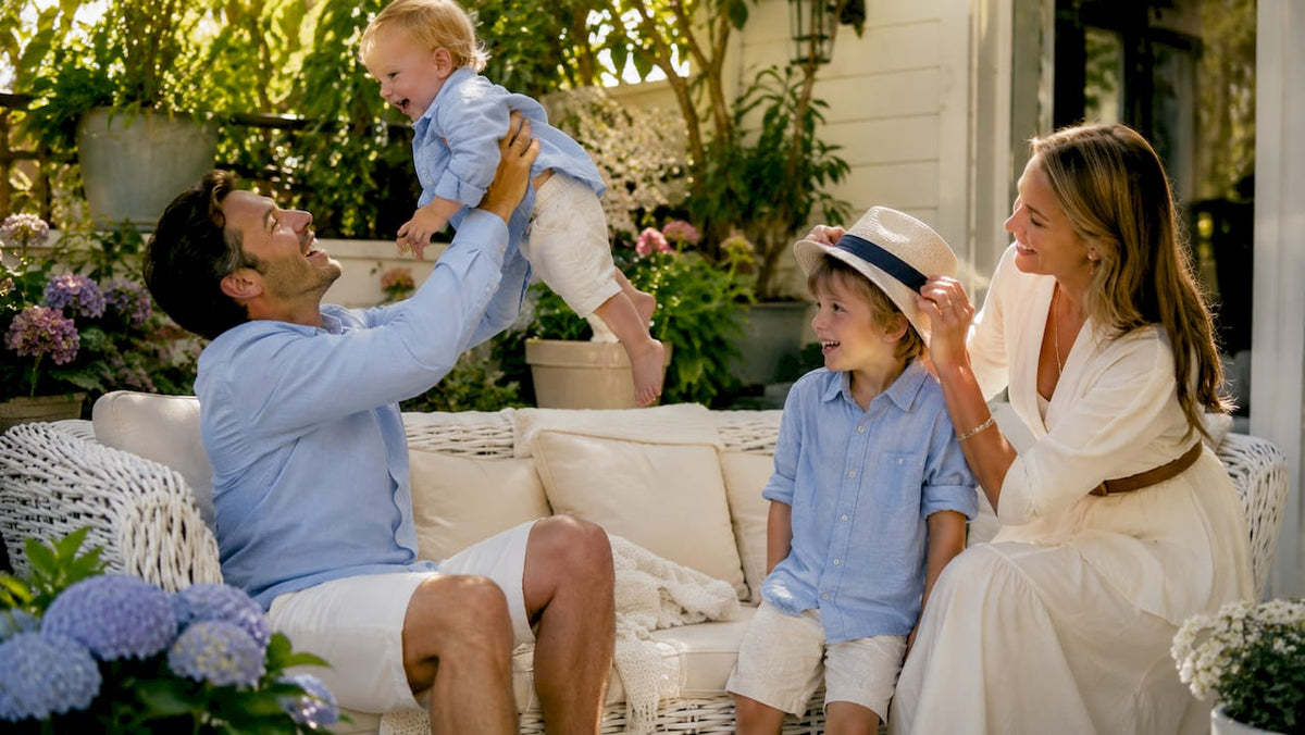 Family in coordinated coastal apparel in living room