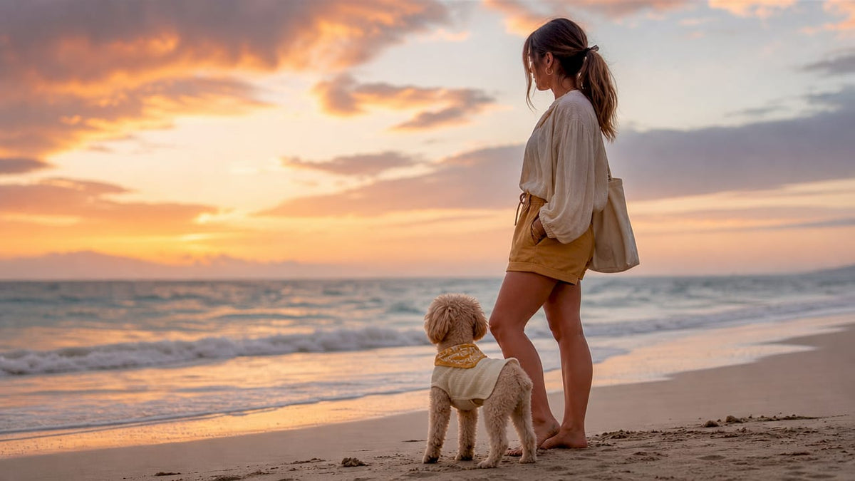 Woman and dog wearing matching outfits outdoors